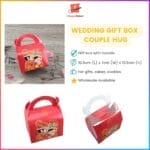 Red wedding gift box with handle and couple design.