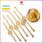 Gold stickers with Happy Bakers branding and design.